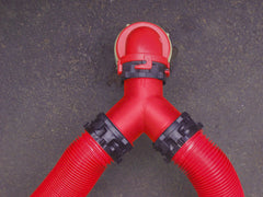 Valterra F02-2030 Sewer Hose Connector -  For Connecting 2 Outlet Hoses To 1 Sewer Hose Line -  Rotating Wye With Bayonet Connectors -  3 Inch Diameter -  Red With Black Connectors