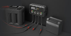 Noco GENIUS2X4 Battery Charger; For 6 Volt/ 12 Volt Batteries; 4 Bank Onboard Charger/ 2 Amp Per Bank; 120 To 240 Volt AC/ 50 To 60 Hz; 8 Amp Charging Current; 9.4 Inch Length x 2.3 Inch Width x 5.7 Inch Height; With Four Interchangeable Connectors/ Four Clamps With Integrated Eyelets/ Four 10 Foot Extension Cords/ Two Self-Tapping Screw/ Type A/ C/ G And I Power Cables